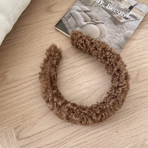 Brown fluffy lamb wool headband for women with a vintage thick plush design for autumn