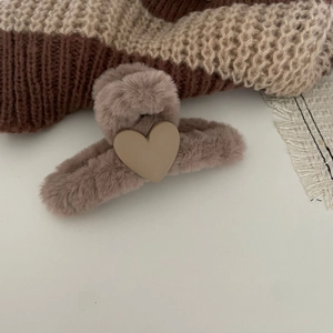 Furry heart claw clip in milk tea pink plush fabric for winter hairstyles