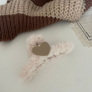 Plush heart hair claw clip in beige and brown for women's elegant winter hairstyle
