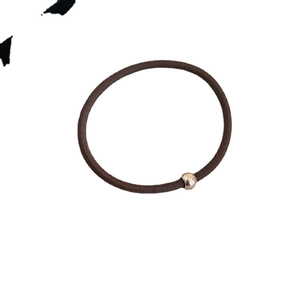 Brown elastic hair tie with a polished gold bead minimalist hair band for women