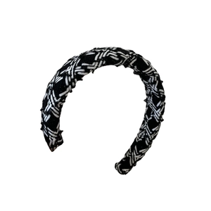 Elegant black and white woven tweed headband with a wide padded design for women