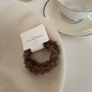 Two-pack brown lamb wool scrunchies set for ponytail with heart pattern card display