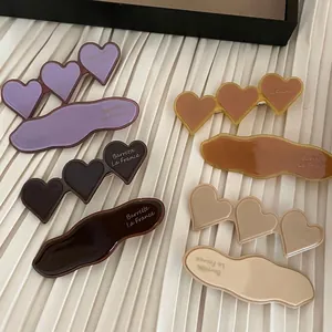 French style heart and wavy acetate hair clips in purple, beige and tortoise colors