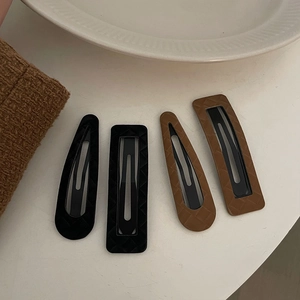 Set of 4 leather texture geometric hair clips in black and brown minimalist style