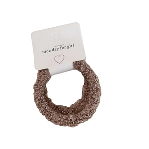 Brown fluffy lamb wool hair scrunchie on card for women's elegant ponytail hairstyles