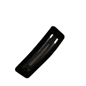 Minimalist black rectangular leather hair clip with geometric lattice pattern design