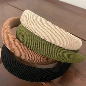 Set of four striped sponge padded headbands in cream, green, brown and black