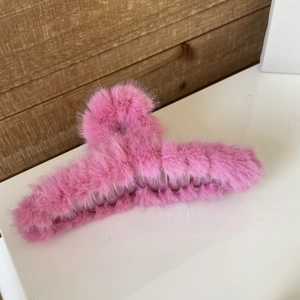 Pink plush faux fur shark hair claw clip for women featuring soft texture and large size