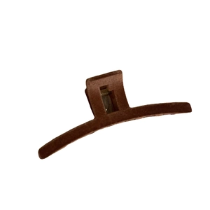 Deep brown flocked oversized hair claw clip for elegant updo styles on a white background