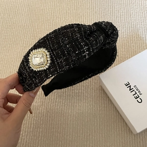 Elegant vintage black tweed knotted headband featuring a large square crystal rhinestone