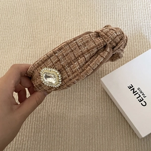 Vintage tweed headband for women featuring a brown wide band and sparkling rhinestone detail