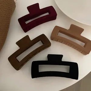 Set of four velvet flocked rectangular hair claws in autumn colors like burgundy and brown