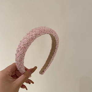 Pink tweed woven headband with thick sponge padding and brown non-slip lining