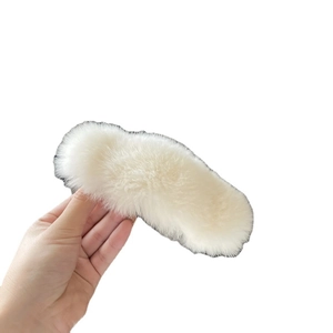 Large cream faux rabbit fur hair claw clip with fluffy plush texture for women
