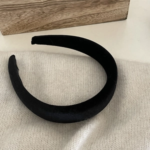 Elegant velvet padded headband for hair volume in classic black minimalist style
