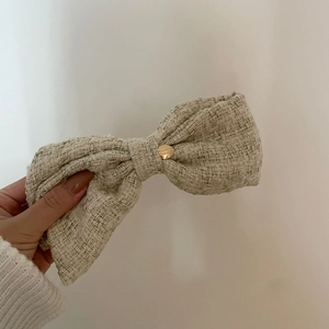 French tweed bow hair clip with gold metal buckle for women in cream white
