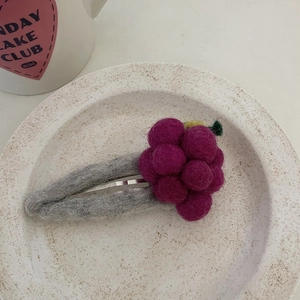Cute handmade wool felt grape hair clip for girls with a grey BB clip and purple fruit design