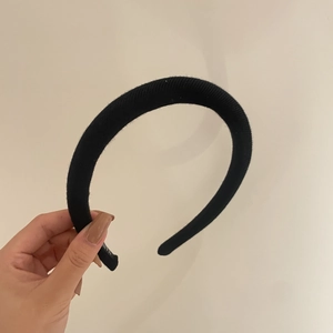 Classic black ribbed knit headband with high-top design and premium thick texture for women