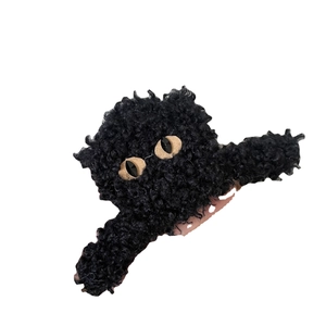 Graziosa pinza per capelli in lana di agnello nera con occhi di cartone animato