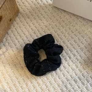 French style black scrunchie with fine silver glitter and elegant pleated fabric texture