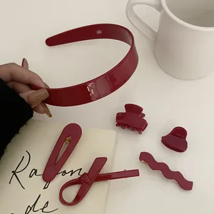 Chic burgundy red acetate hair clips set including headband and various stylish clips