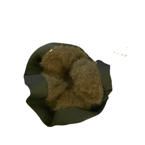 Furry oversized scrunchie with dark green fabric and brown faux fur for hair styling