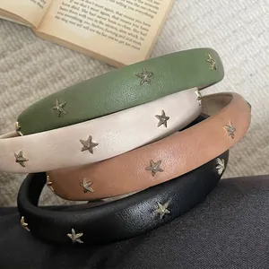 Handmade leather headbands with gold star studs in brown, black, cream and green