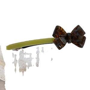 3D acetate bow hair clip in green and tortoiseshell pattern for elegant side styling