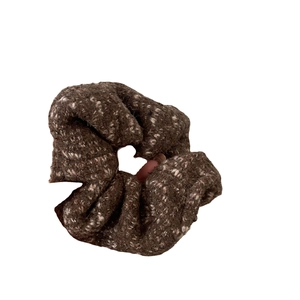 Minimalist brown wool fabric scrunchie with thick knitted texture for retro hair styling