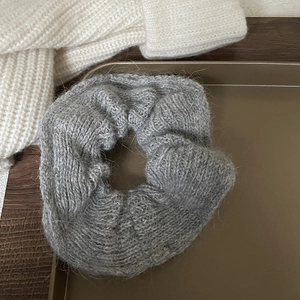 Gray chunky knit mohair scrunchie hair tie for women with soft winter texture