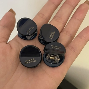 Set of four small round acetate hair claw clips in navy blue with gold France handmade logo