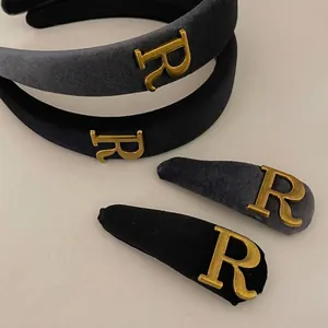 Elegant velvet padded headband and clip set with gold metal R letter in gray and black