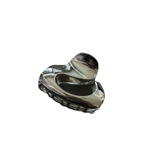 Minimalist silver heart-shaped metal hair claw clip with black teeth on white background