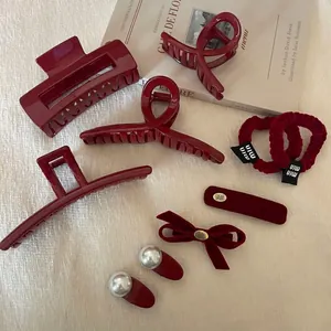 Elegant burgundy hair accessory set featuring velvet bow clips and pearl shark clips