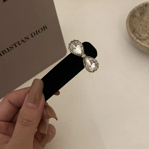 Eleganter Kristall-Haarclip mit Schleife, Strasssteinen und goldenem gedrehtem Metallrahmen