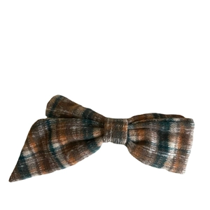 Vintage pumpkin plaid bow hair clip with textured brown and navy tweed pattern