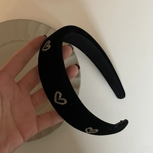 Black velvet wide headband with sparkling crystal heart charms and elegant C-shaped design