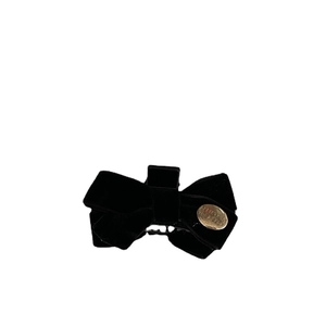 French vintage black velvet bow hair clip with gold metal tag and BELIEVE YOURSELF text
