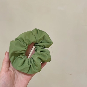 Avocado green PU leather headband with pleated texture and stylish high top design