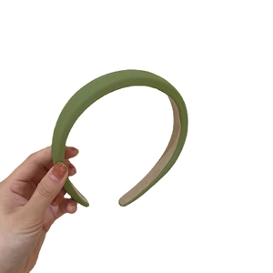 Padded avocado green PU leather headband with high top design and non-slip lining