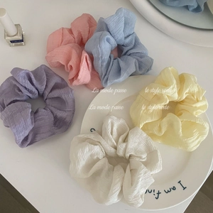 Five-piece macaron pleated scrunchie set in soft pastel colors for elegant hair styling
