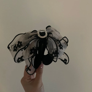 French organza flower hair claw clip with black floral print and sparkling rhinestone