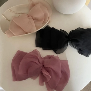 Three-piece large layered organza bow hair clips in pink, black, and purple set