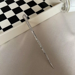 Modern minimalist irregular liquid metal hair stick in silver with lava texture finish