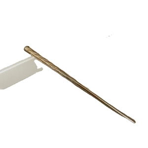 Minimalist irregular gold metal hair pin with hammered texture for elegant bun hairstyles