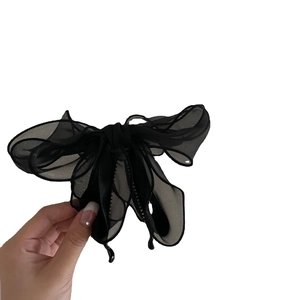 Elegant black mesh bow hair claw clip for women made of layered organza fabric
