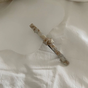 Elegant knot acetate hair clip with cream marble texture and Korean style design