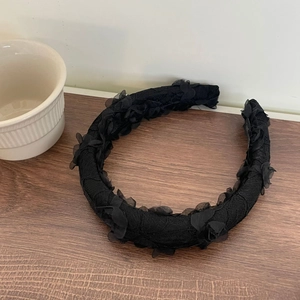 Elegant black lace floral headband with 3D petals for a vintage French style look