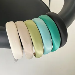 Padded satin headband set in multiple colors like green and champagne for women