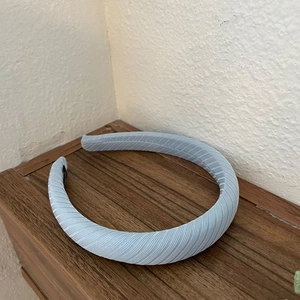 Light blue pleated wide headband with striped texture in a minimalist Korean style